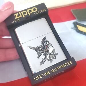 Vintage Zippo Lighter–Bat & Demon & Woman in Battle–1997 NIB
